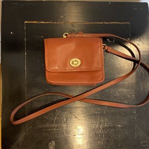 Coach Mini cross body wallet, great for concerts and shows. So light & mini!